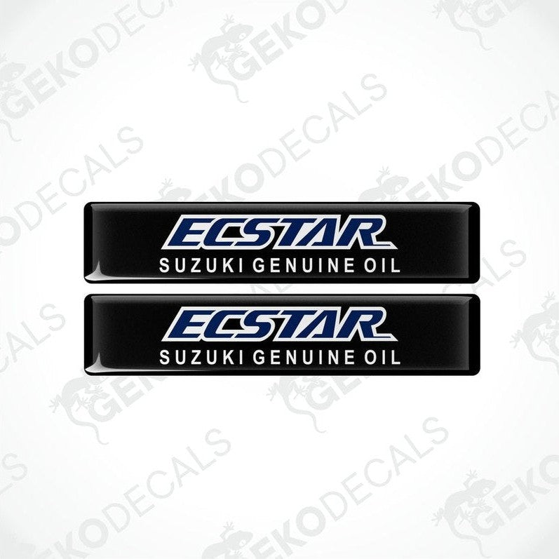 Two black vinyl stickers with the text 'ECSTAR SUZUKI GENUINE OIL' in white and blue.