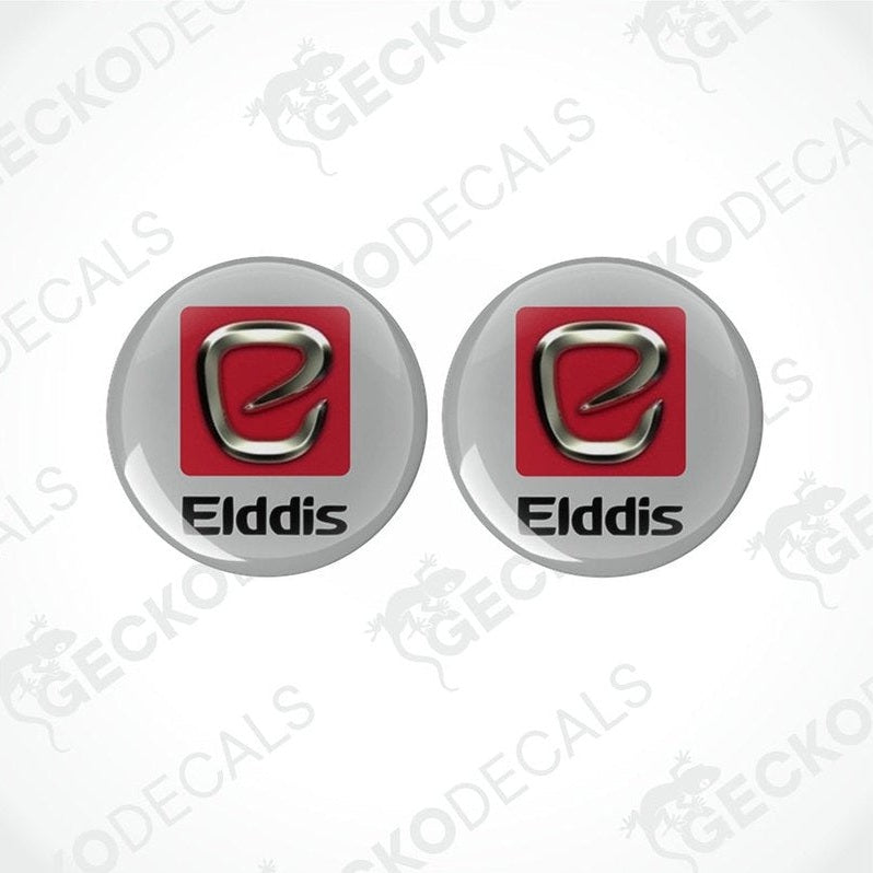 Two round vinyl decals with a polyurethane coating, featuring the Elddis logo in red and silver colors on a white background.