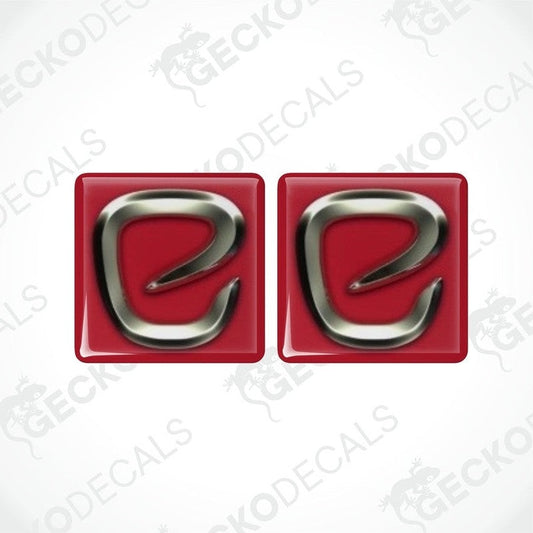 Two red and silver vinyl stickers with a polyurethane coating, displayed against a white background with the GeckoDecals logo.