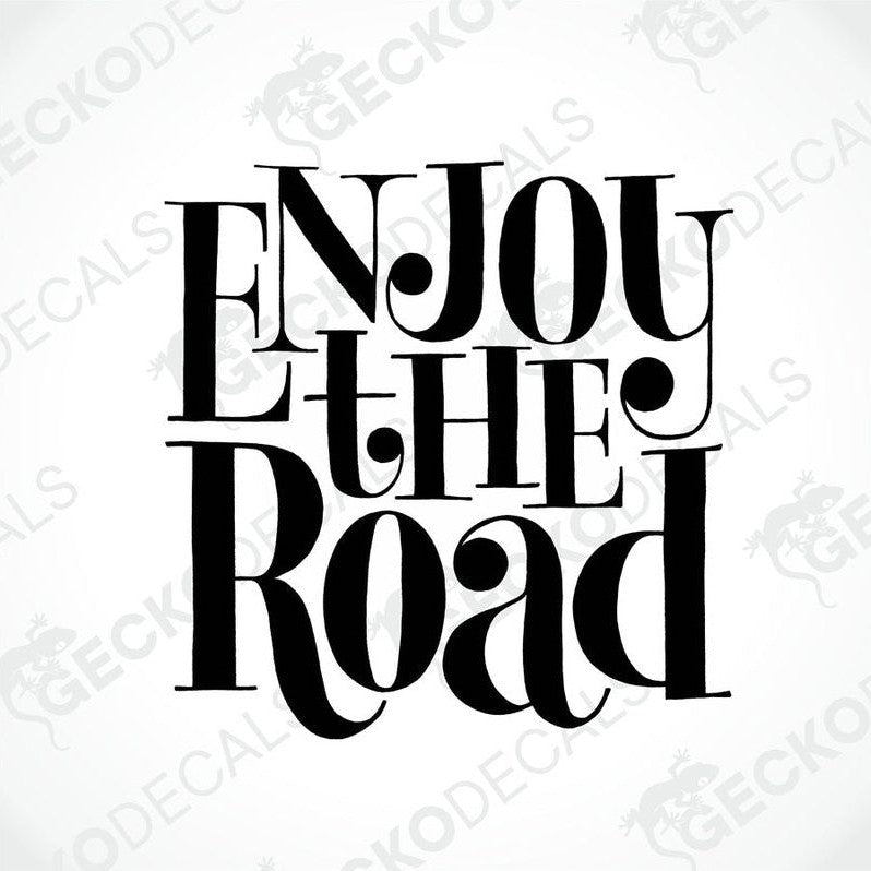 Black die cut sticker with the text 'ENJOY THE ROAD' in a bold font.