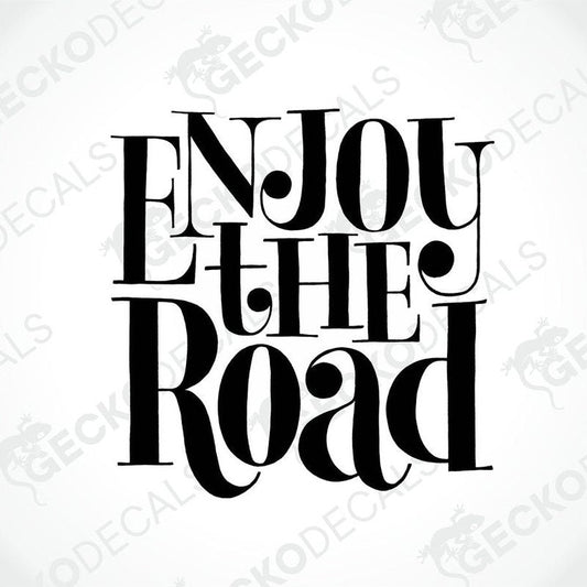 Black die cut sticker with the text 'ENJOY THE ROAD' in a bold font.