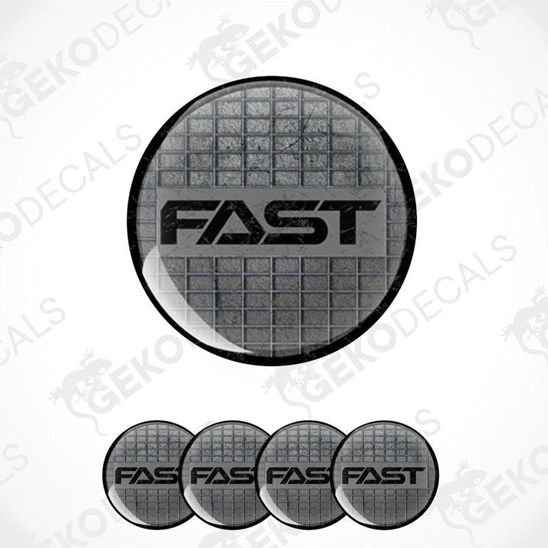 A set of four black vinyl stickers with the word 'FAST' and a geometric pattern in the background.