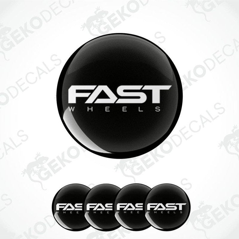 A set of four black vinyl stickers with the text 'FAST WHEELS' in white. Each sticker has a white border and the Gecko Decals logo is visible on the top left.