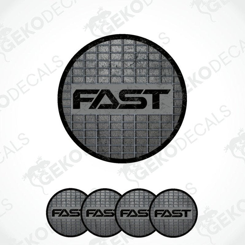 A set of four black vinyl stickers with the word 'FAST' and a geometric pattern in the background.