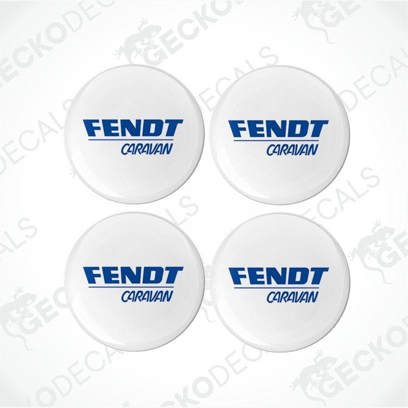 A set of four white vehicle decals with the Fendt Caravans brand logo in blue and red.