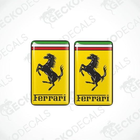 Two vinyl stickers with a yellow, black, red, and green Ferrari logo design.