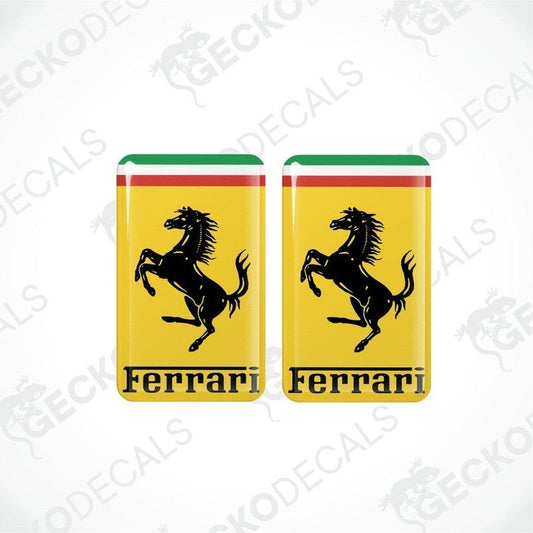 A set of two multicolored vinyl stickers with a Ferrari logo on a white background.
