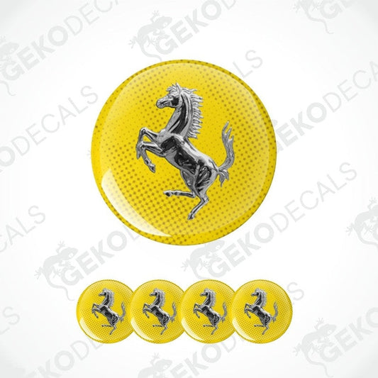 A set of four yellow vinyl stickers with a silver Ferrari horse logo design.