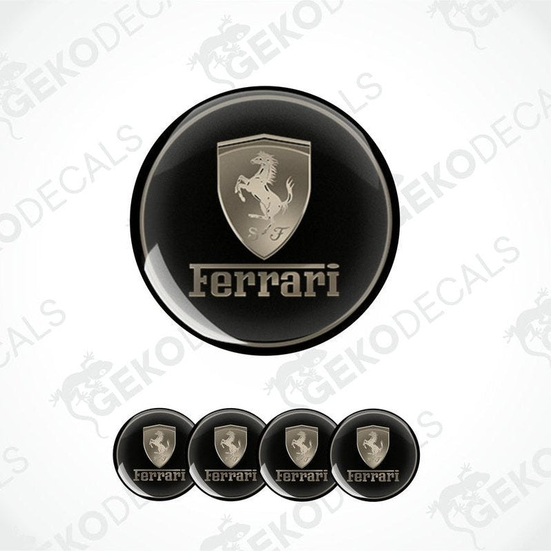 A set of four round black vinyl stickers with the Ferrari logo in the center.