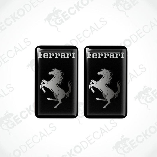Two black vinyl stickers with the Ferrari logo, designed for use as car decals.