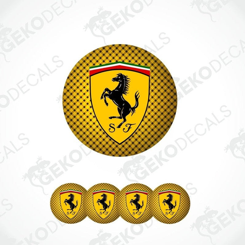 A set of yellow vinyl decals with the Ferrari logo, including one large emblem and four smaller ones.