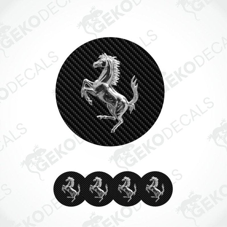 Ferrari logo decal with a horse emblem on a black circle, surrounded by smaller versions of the logo.