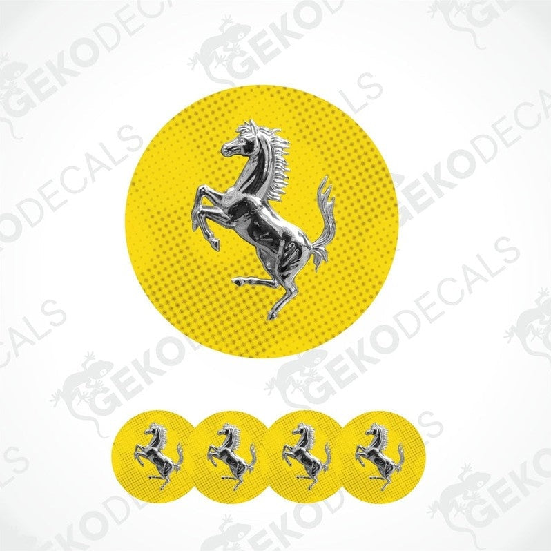 A set of four yellow vinyl stickers with a silver Ferrari horse logo design.