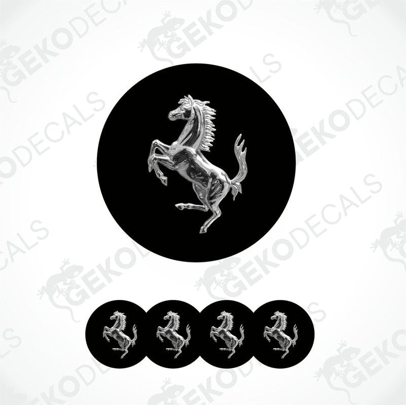 A set of four black vinyl stickers with a silver Ferrari horse logo design.