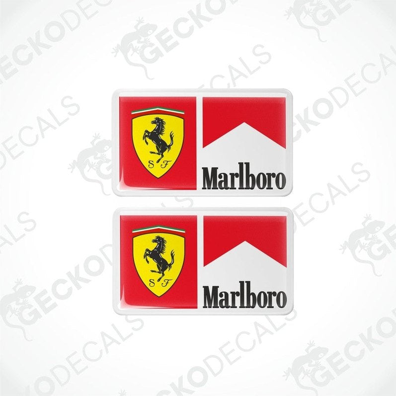 Two vinyl decals for a Ferrari Marlboro vehicle, featuring the car brand's emblem and the Marlboro logo.