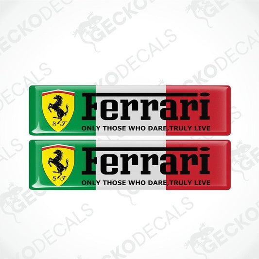 Two rectangular vinyl stickers with a red, yellow, black, and green Ferrari logo and the text 'Ferrari Only Those Who Dare Truly Live'.