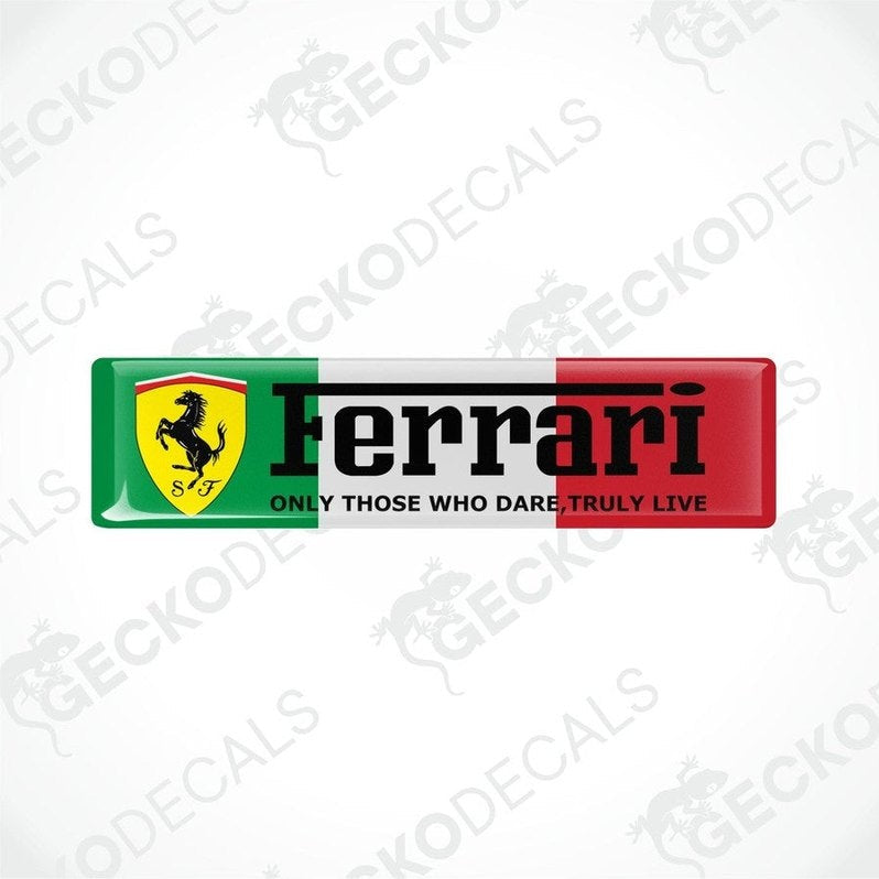 Rectangular vinyl stickers with a red, yellow, black, and green Ferrari logo and the text 'Ferrari Only Those Who Dare Truly Live'.