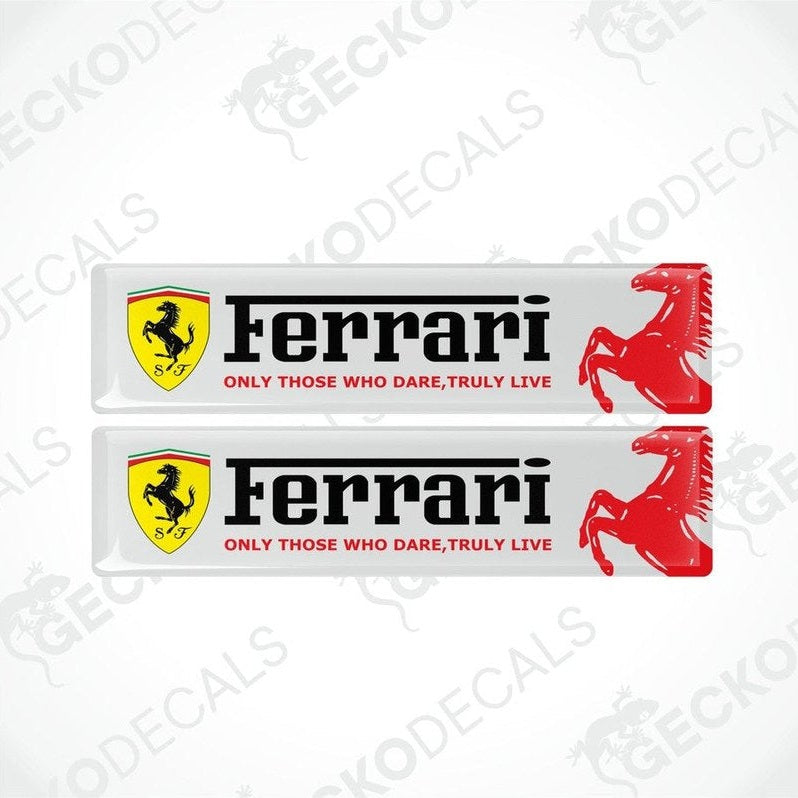 Two white decals with red and yellow Ferrari logo and the text 'Ferrari Only those who truly live'.