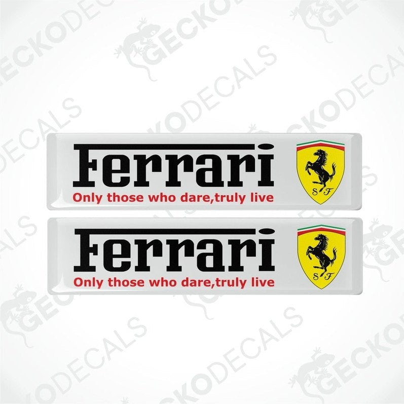 Two rectangular white vinyl decals with the Ferrari logo and the text 'Only those who dare, truly live' on a white background.