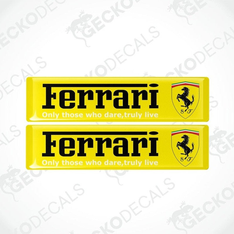 Two rectangular yellow vinyl decals with the Ferrari logo and the text 'Only those who dare, truly live' on a yellow background.