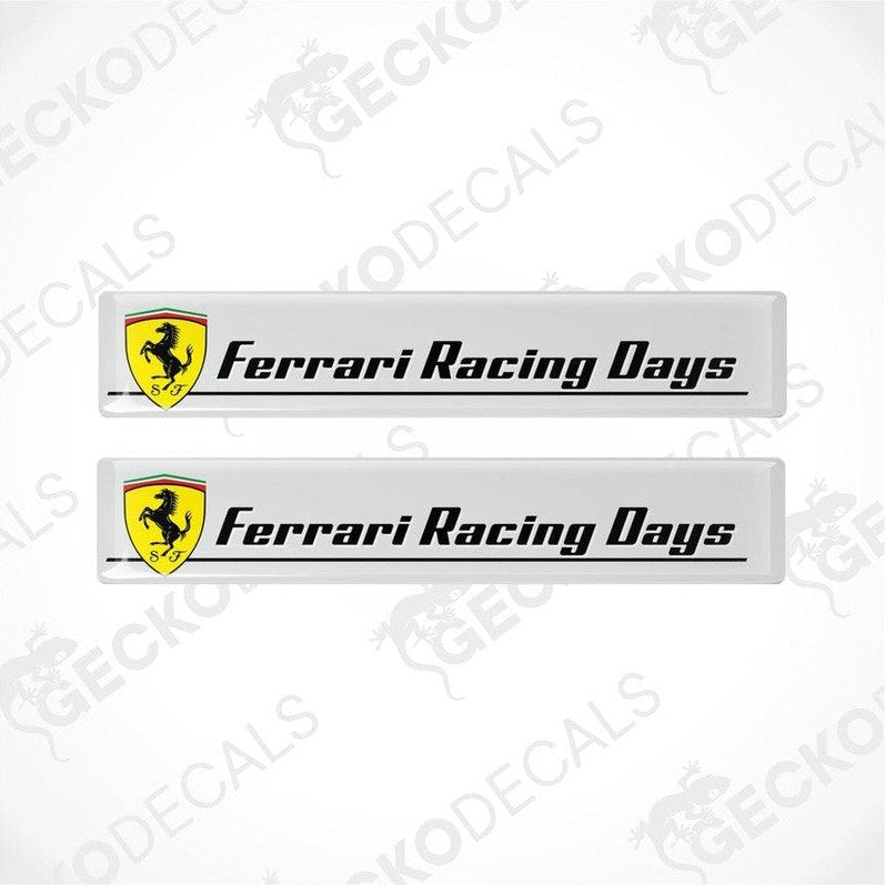 Two white vinyl stickers with the text 'Ferrari Racing Rays' and the Ferrari logo in the center.