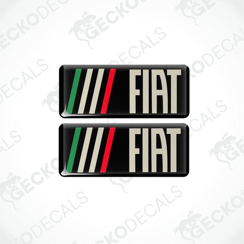 Two rectangular car decals with a geometric pattern and the brand name 'FIAT' written in capital letters.