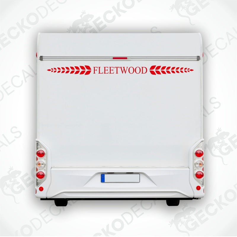 A die cut sticker with the text 'Fleetwood' displayed on the rear of a white caravan, bordered with red decorative elements.