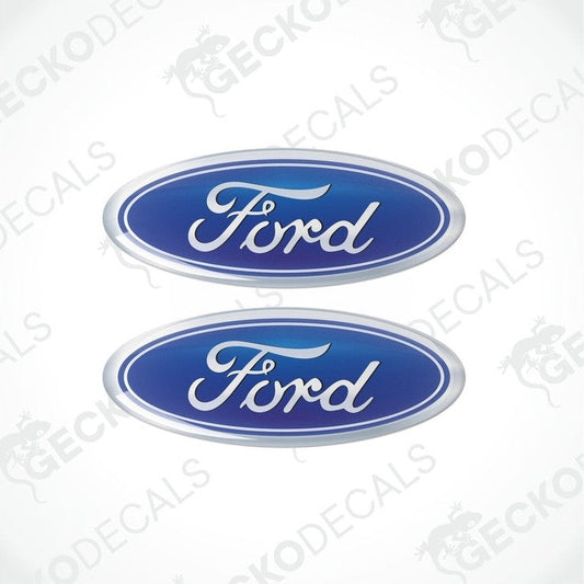 Two blue vinyl stickers with the FORD logo, designed to be applied on a vehicle.