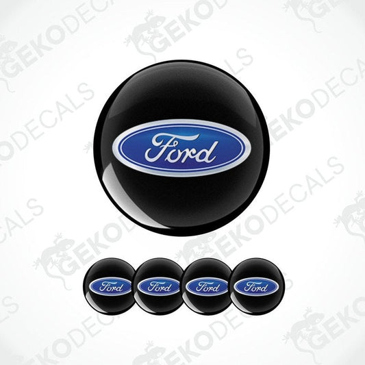 A set of four black vinyl decals with the Ford logo in blue.