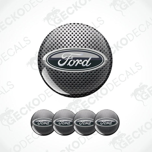 Ford logo car wheel center cap with five additional caps on a white background.