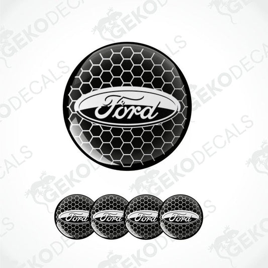 A set of four black vinyl stickers with the FORD brand logo, designed to be applied on car wheel caps.