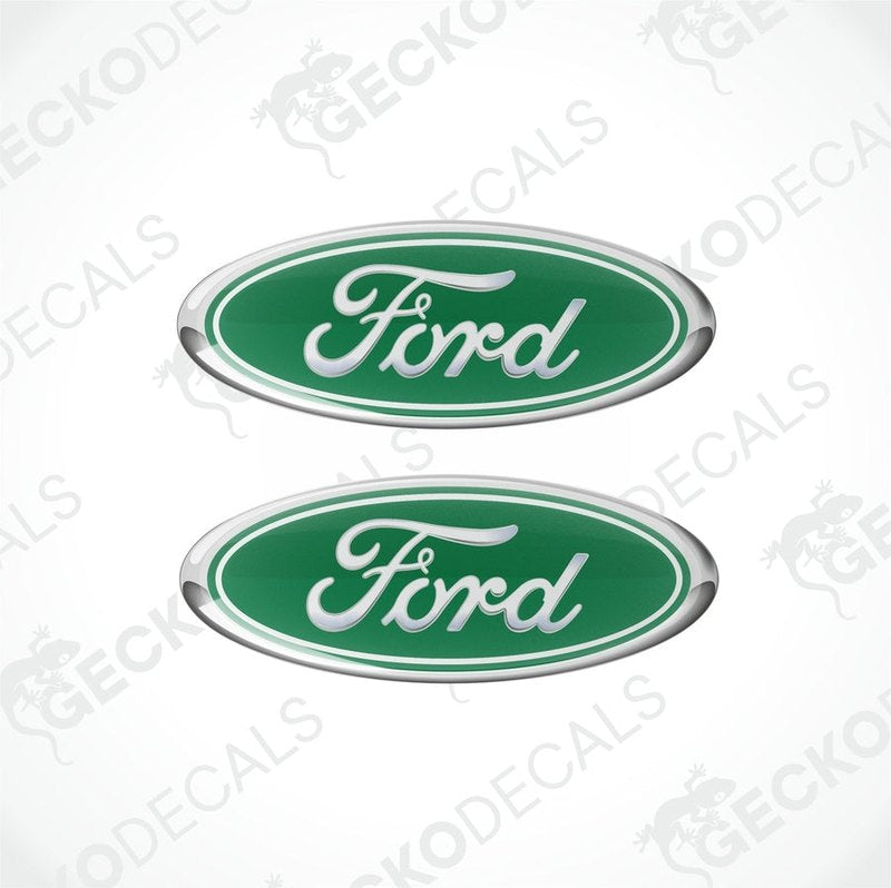 Two green oval-shaped Ford vehicle decals with white and silver text.