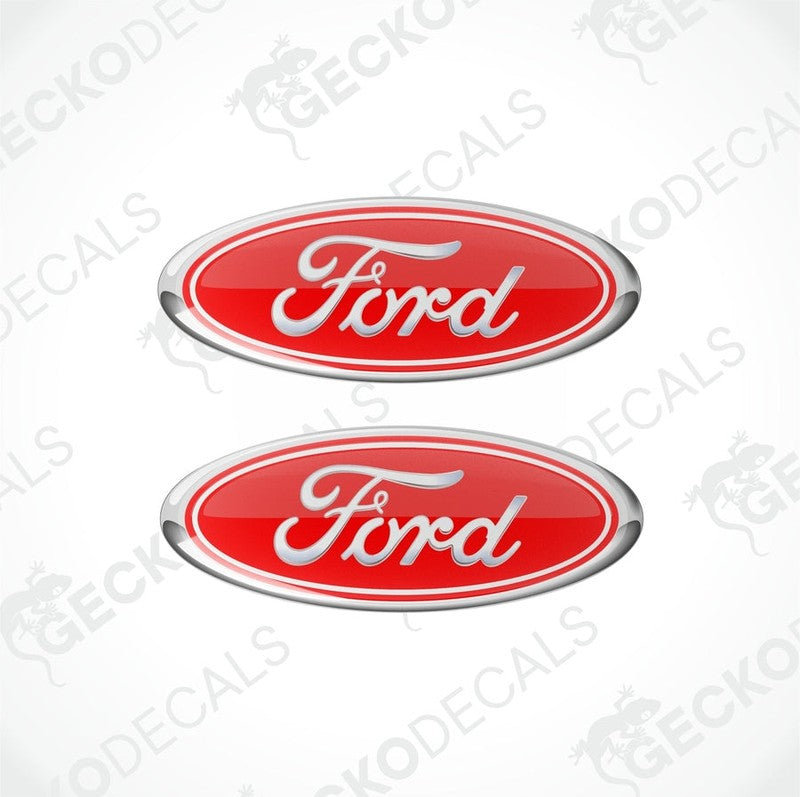 Two red oval-shaped Ford vehicle decals with white and silver text.