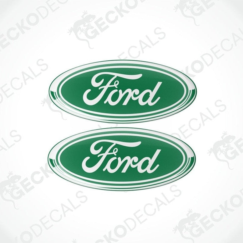 Two green oval-shaped vinyl decals with the 'Ford' brand logo in white lettering.
