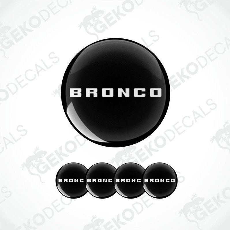 A set of black vinyl decals with the text 'BRONCO' on them, displayed on a white background.