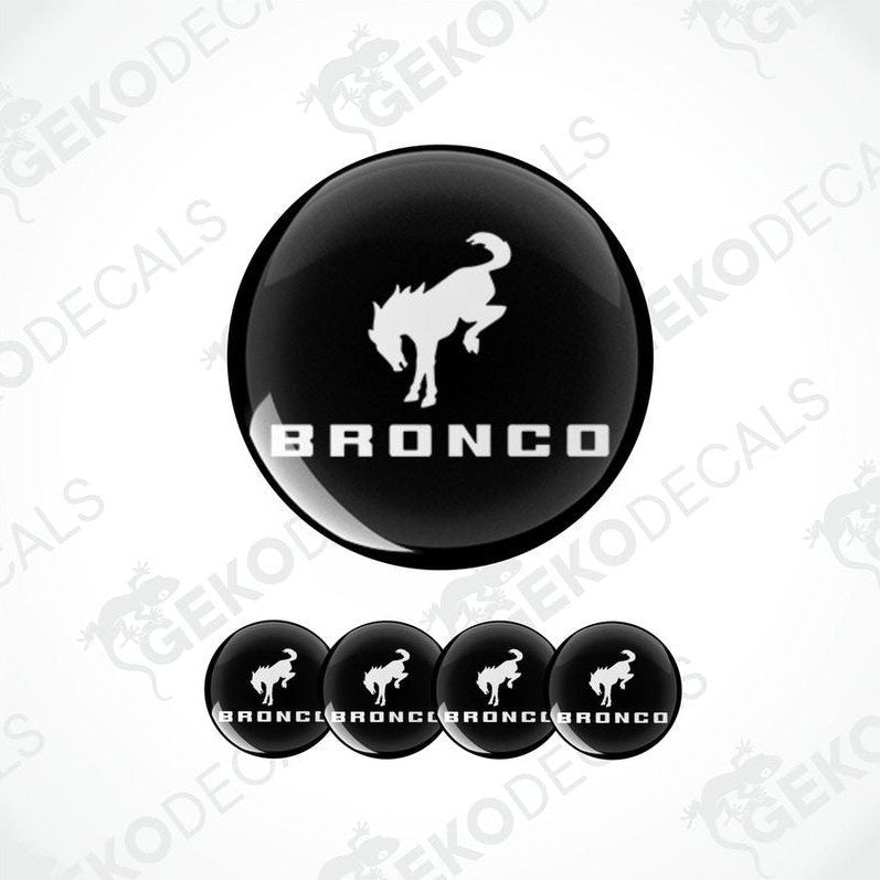 A set of black vinyl decals with the text 'BRONCO' and an image of a horse. The set includes one large decal and three smaller ones.