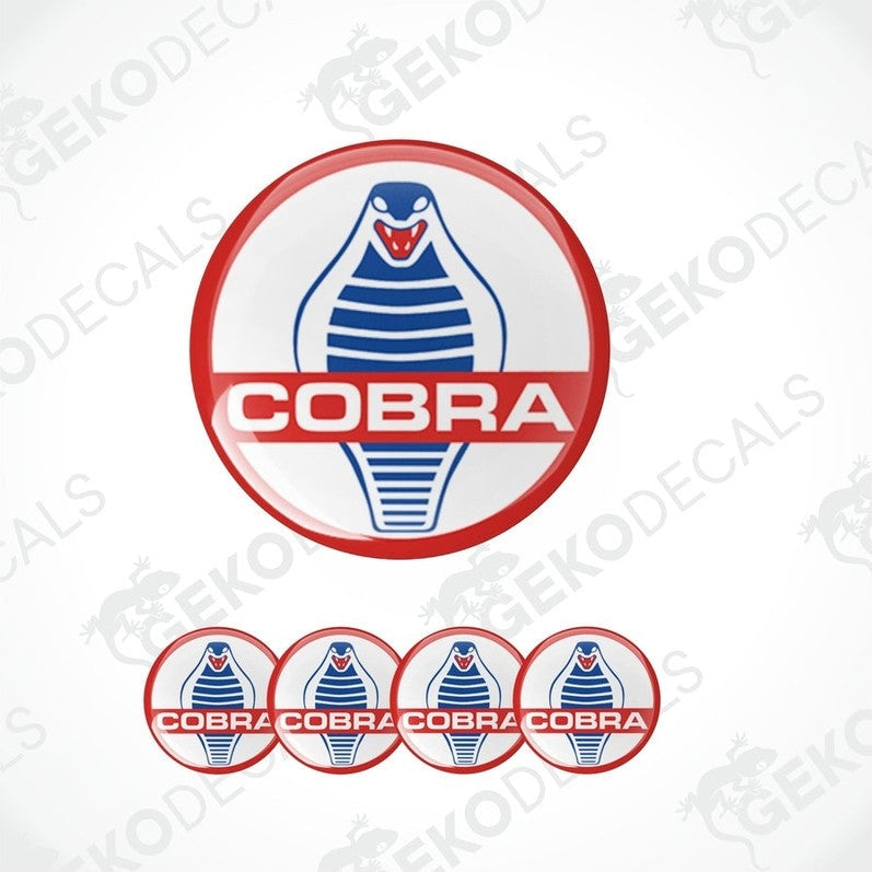 A set of four vinyl decals with a polyurethane coating featuring the Cobra logo in red and blue on a white background.