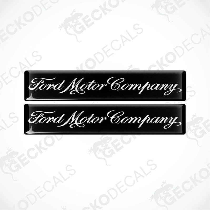 Two black vinyl decals with the Ford Motor Company logo in white.