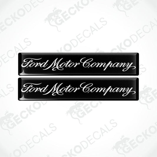 Two black vinyl decals with the Ford Motor Company logo in white.