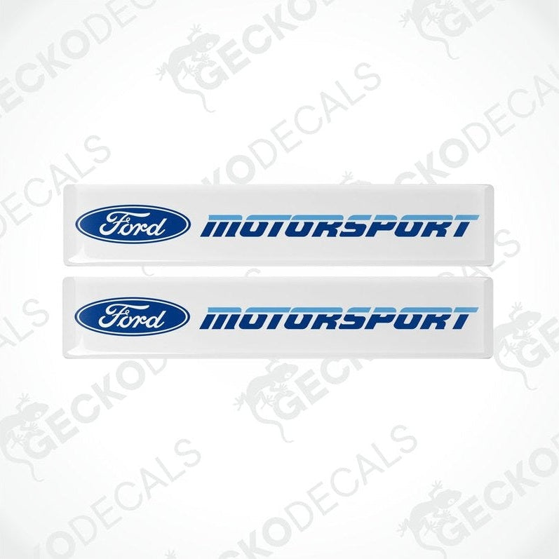 Two white vinyl decals with the Ford Motorsport logo in blue.