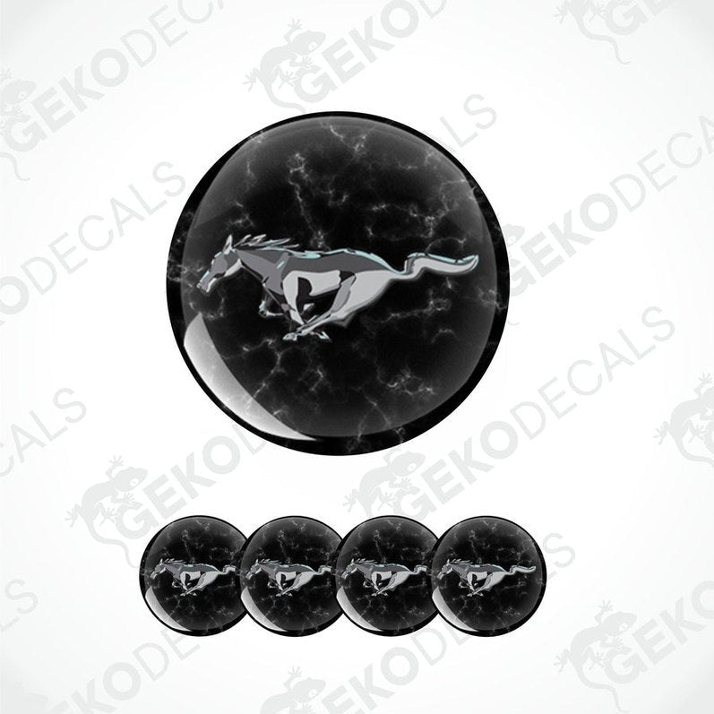 A set of four black vinyl decals with a white horse pattern, likely representing the FORD MUSTANG logo.