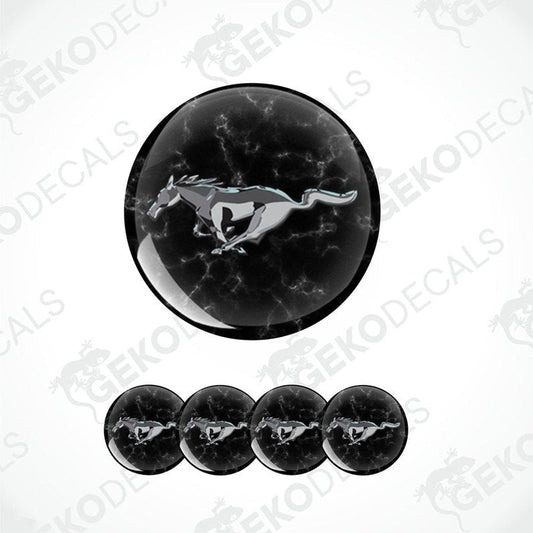 A set of four black vinyl decals with a white horse pattern, likely representing the FORD MUSTANG logo.