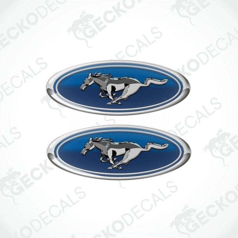 Two blue, silver, and white vinyl stickers with a horse and the FORD MUSTANG logo on them.