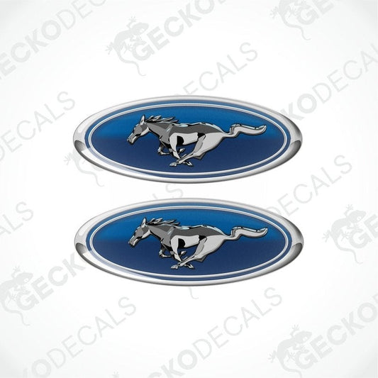 Two blue, silver, and white vinyl stickers with a horse and the FORD MUSTANG logo on them.