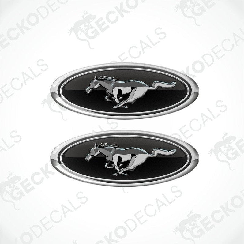 Two black, silver, and white vinyl stickers with a horse and the FORD MUSTANG logo on them.