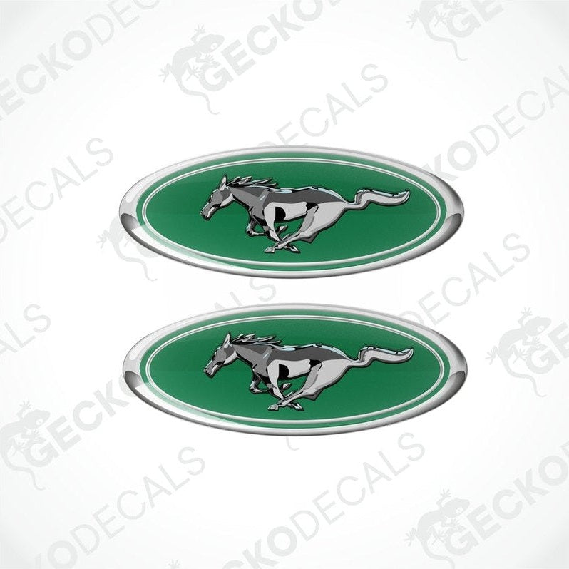 Two green, silver, and white vinyl stickers with a horse and the FORD MUSTANG logo on them.