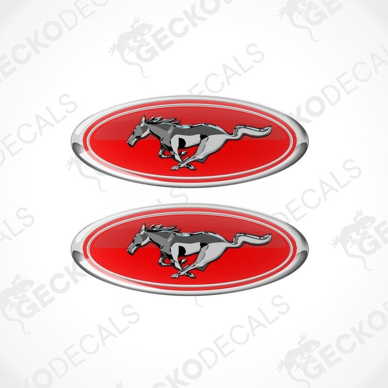 Two red, silver, and white vinyl stickers with a horse and the FORD MUSTANG logo on them.