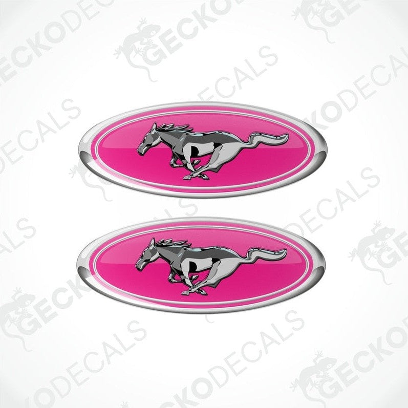 Two pink, silver, and white vinyl stickers with a horse and the FORD MUSTANG logo on them.