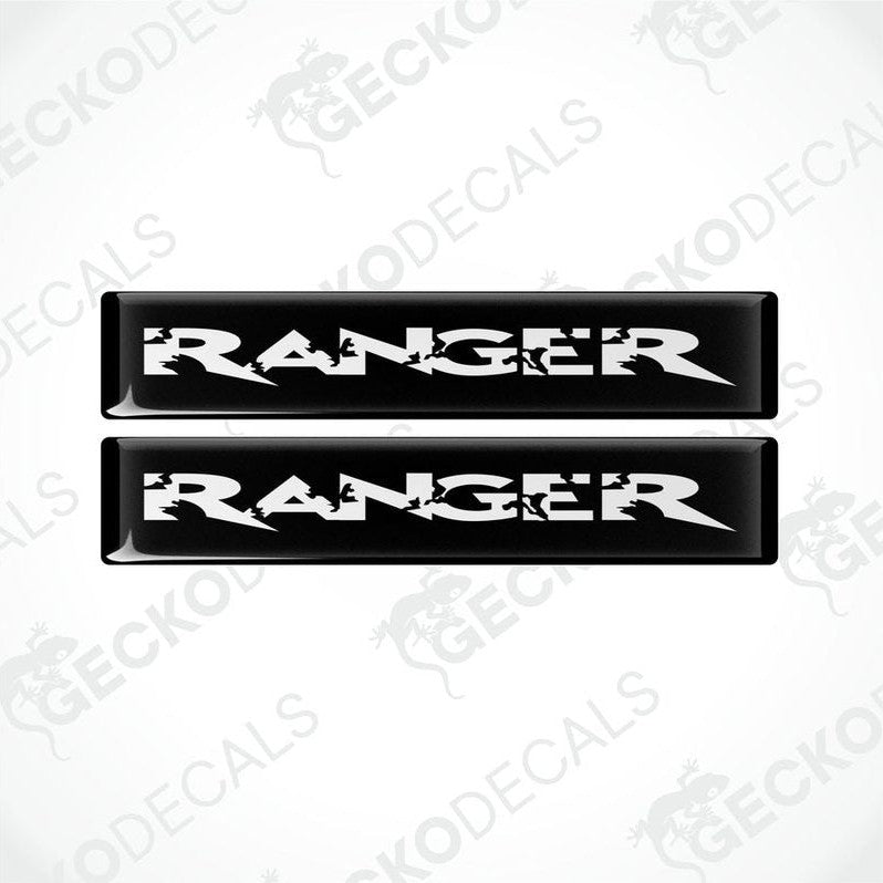 Two black vinyl stickers with the word 'RANGER' in white text, placed against a white background.