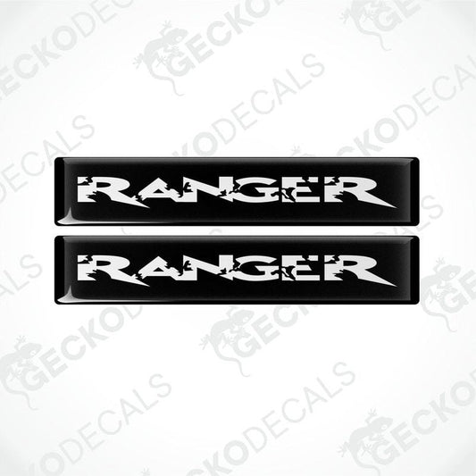 Two black vinyl stickers with the word 'RANGER' in white text, placed against a white background.